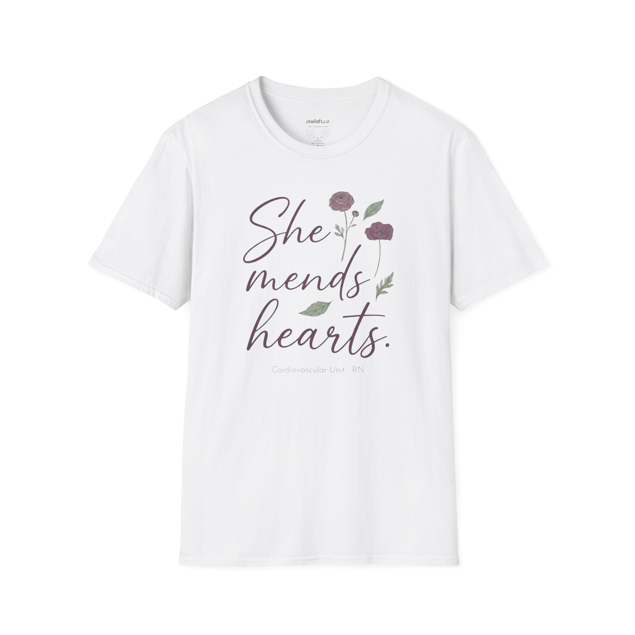 White t-shirt with 'She mends hearts' text and floral design on a white background