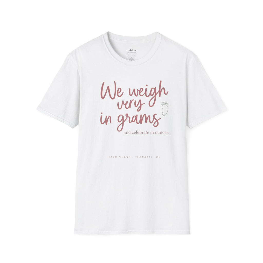 White t-shirt with pink text that states we weigh every foot in grams and celebrate in ounces on a white background